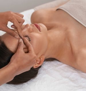 view-woman-getting-facial-yoga-massage-stay-young_optimized
